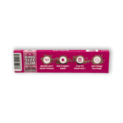 PURIZE Pink King Size Slim Papers neben gedrehtem Produkt für ein stilvolles Raucherlebnis